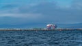 Fish farm and oil platform. Orkney, Scotland